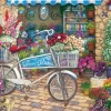 Cobble Hill Fiets bij de bloemenwinkel - puzzel van 275 XXL stukjes